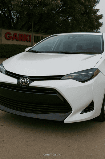 Close-up shot of a clean Tokunbo Toyota parked at Garki Market