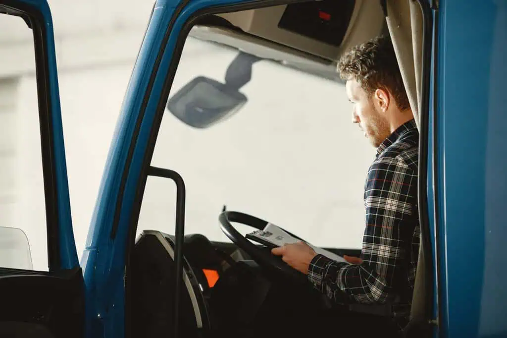 Young white truck driver during a break